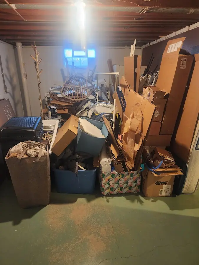 Roll-off dumpster container at job site for Construction Dumpster Rental in Manorhaven